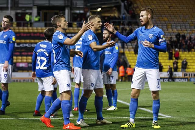 Pompey celebrate their win at Bradford. Picture: Daniel Chesterton