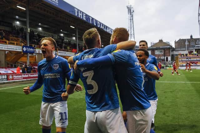 Gareth Evans celebrates with team-mates after grabbing the decisive goal against his former club. Picture: Daniel Chesterton/phcimages.com