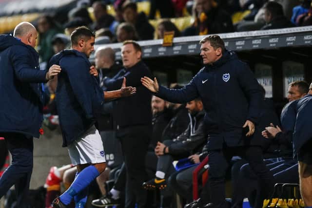 Assistant manager Joe Gallen congratulates Gareth Evans after being substituted. Picture: Daniel Chesterton/phcimages.com