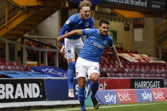 Gareth Evans of Portsmouth celebrates with Ronan Curtis of Portsmouth after scoring his side's first goal to make the score 0-1 during the Sky Bet League One match between Bradford City and Portsmouth at Valley Parade on November 3rd 2018 in Bradford, England. (Photo by Daniel Chesterton/phcimages.com)