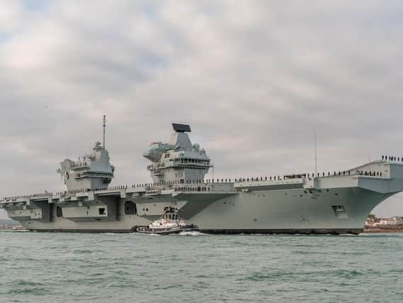 HMS Queen Elizabeth leaving Portsmouth. Picture: Shaun Roster
