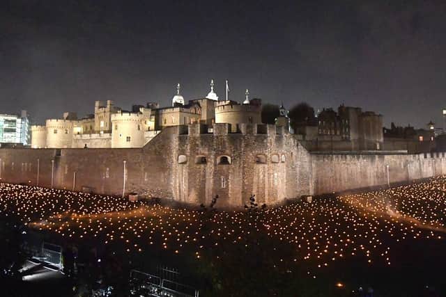 Thousands of flames in the dry moat of the Tower of London as part of an installation called Beyond the Deepening Shadow: The Tower Remembers, to mark the centenary of the end of First World War. Picture: John Stillwell/PA Wire