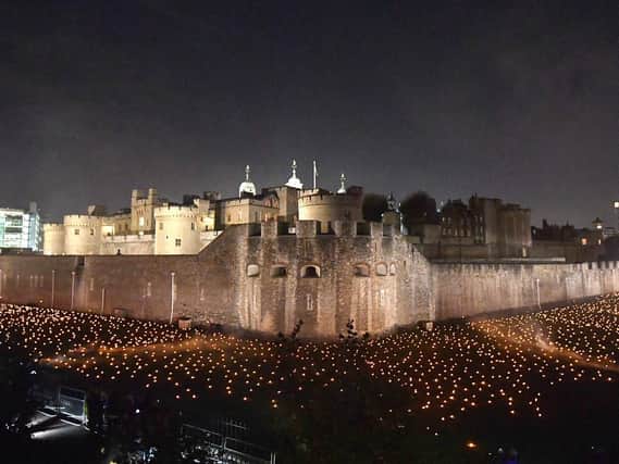 Thousands of flames in the dry moat of the Tower of London as part of an installation called Beyond the Deepening Shadow: The Tower Remembers, to mark the centenary of the end of First World War. Picture: John Stillwell/PA Wire