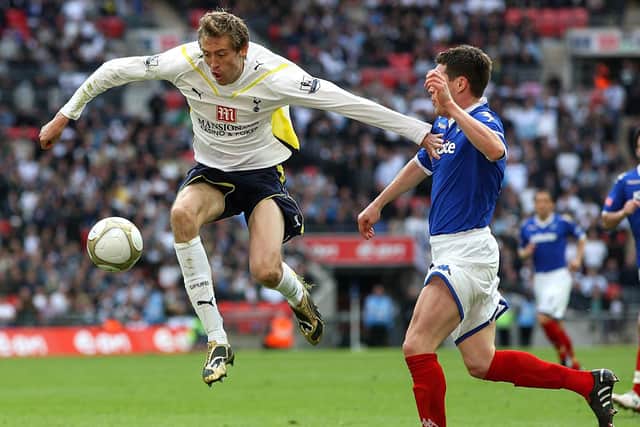 Tottenham Hotspur's Peter Crouch (left) and Portsmouth's Hayden Mullins (right) in action during the FA Cup, Semi Final at Wembley Stadium, London. Picture: Nick Potts/PA Wire.
