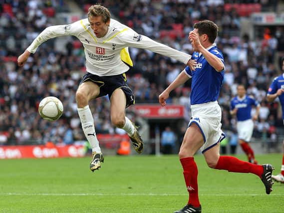 Tottenham Hotspur's Peter Crouch (left) and Portsmouth's Hayden Mullins (right) in action during the FA Cup, Semi Final at Wembley Stadium, London. Picture: Nick Potts/PA Wire.