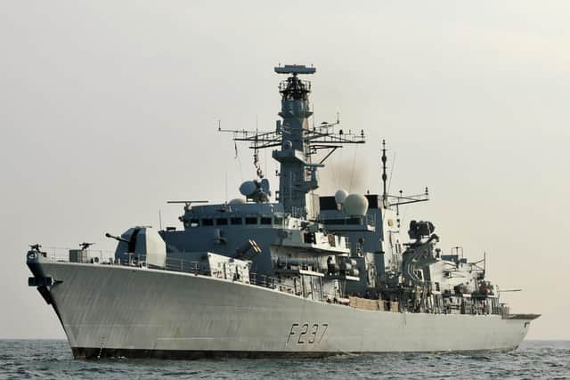 HMS Westminster cuts through the icy waters of the Norwegian sea.