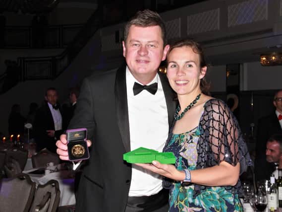 Lieutenant Commander Fiona Haynes MBE with Matt Crookes, who works for BAM