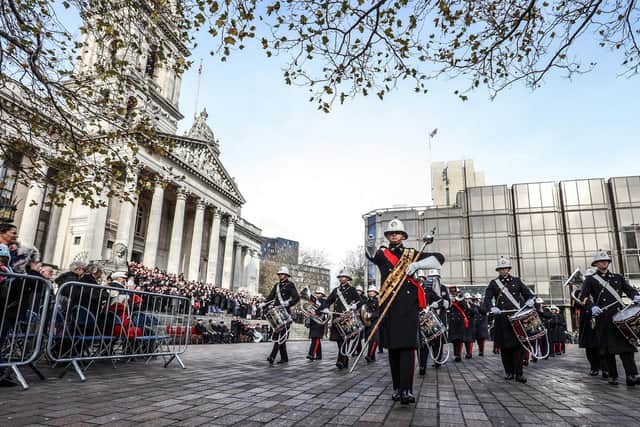Pictured is the Royal Marines Band march through Guildhall Square for Remembrance 
Photo: Royal Navy