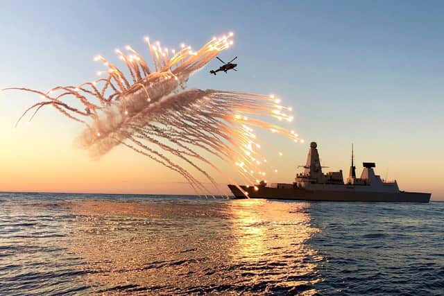 A Wildcat helicopter belonging to the Royal Navys Type 45 destroyer HMS Diamond test firing her defensive flare systems while on maritime security operations in the Mediterranean. Picture: Lt Cdr Oliver Clark/Royal Navy.