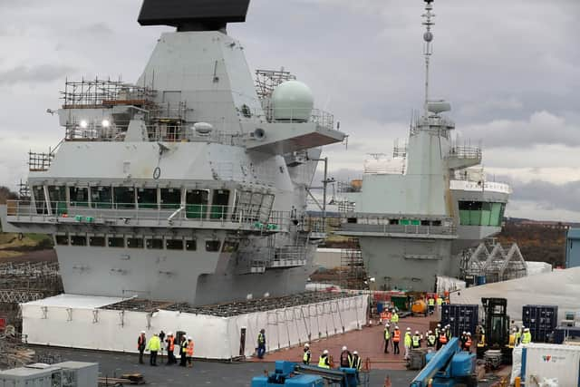 Work continues on the flight deck during a tour of the under-construction aircraft carrier, HMS Prince of Wales, at BAE Systems in Rosyth, Fife.  Picture: Andrew Milligan/PA Wire.