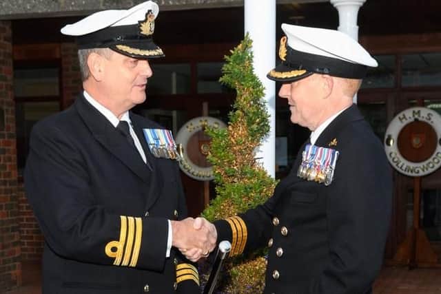 Commander David Johnston took his final divisions before departing HMS Collingwood for a new post and handing over to Commander Mark Walker