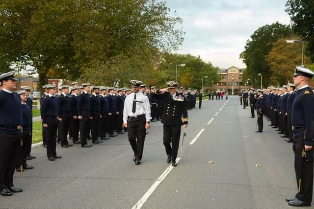 Commander David Johnston took his final divisions before departing HMS Collingwood for a new post and handing over to Commander Mark Walker
