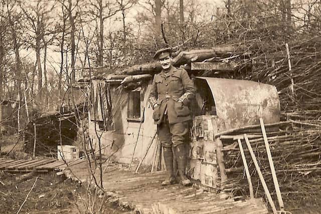 Captain Bob Bennett outside Somerset House, which was found in a scrapbook belonging to Captain Robert Harley Egerton Bennett, that contains a series of photographs documenting life on the front line in Ypres from October 1914 to January 1915, during the First World War. Picture: A.C.H.Bennett/PA Wire