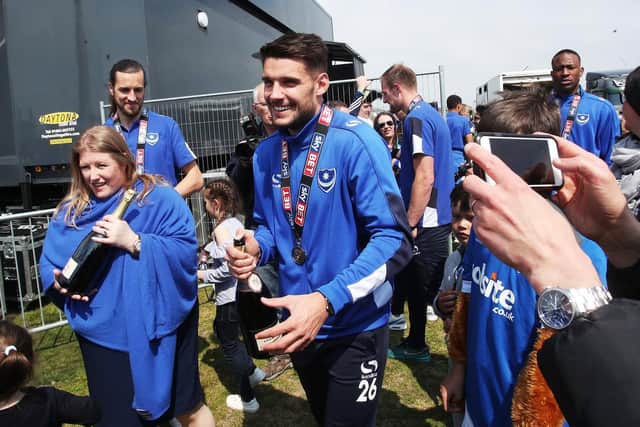 Gareth Evans enjoys himself at Southsea Common celebrations following Pompey's League Two title success. Picture: Joe Pepler