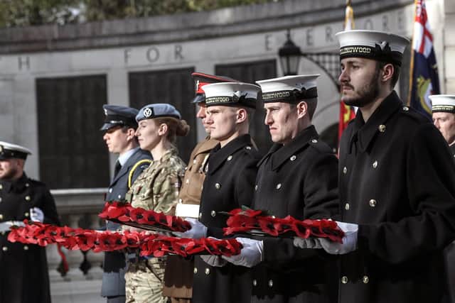 Captured is personnel from the Royal Navy and Royal Marines at the Guildhall square, Portsmouth during a Remembrance service. Photo: LPhot Sam Seeley/Royal Navy