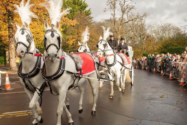 The arrival of Santa was greeted by hundreds of well-wishers. Picture Credit: Keith Woodland