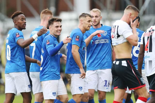 Pompey celebrate Ben Thompson's opener. Picture: Joe Pepler