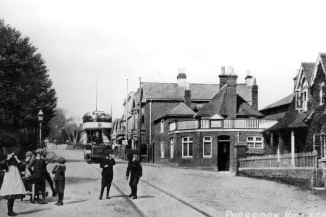 THEN: Paassing through Purbrook is a Portsdown & Horndean Light Railway car heading for Cosham.