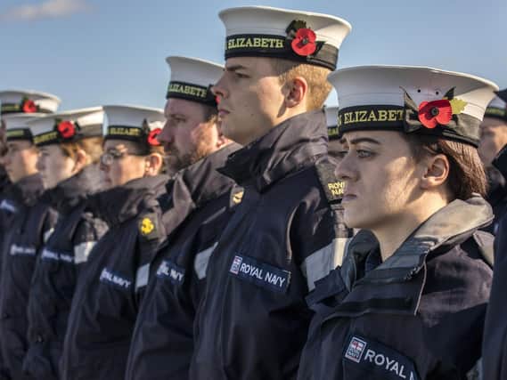 HMS Queen Elizabeth took time out of her busy F35B trials to remember the fallen with her own Remembrance Service. Picture: LPhot Jay Allen/ Royal Navy