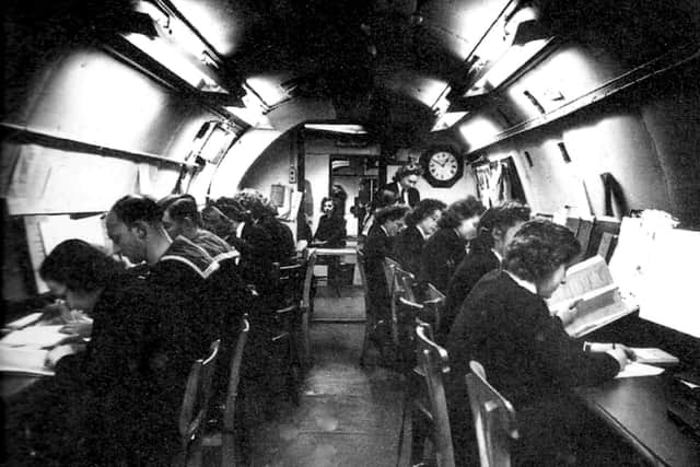 Not all at sea: sailors and Wrens working deep under Fort Southwick shortly before D-Day.