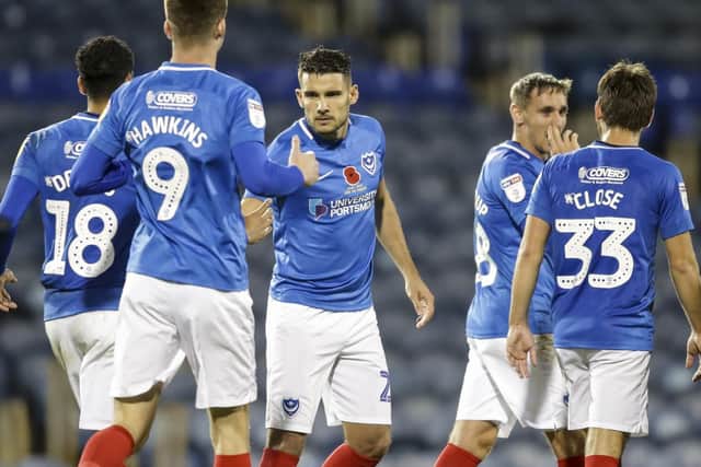 Gareth Evans is congratulated after he scores to make it 2-1 Robin Jones/Digital South.