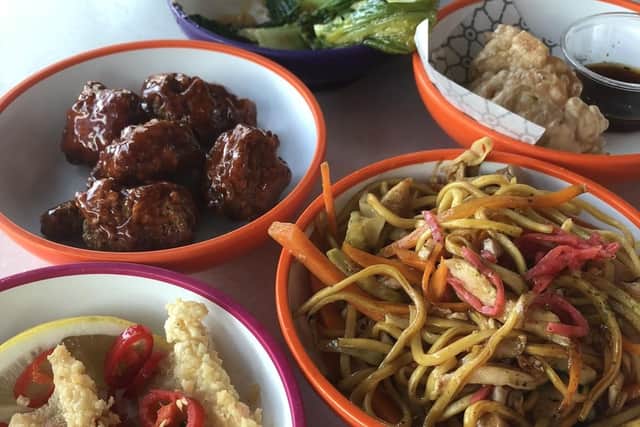 Clockwise from left - spicy pepper squid, korean fried chicken, stir fried pak choi and garlic, prawn gyoza and chicken yakisoba