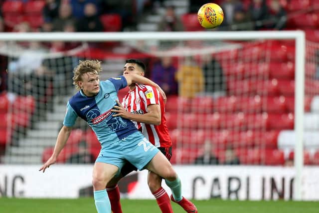 Sunderland's Reece James and Wycombe Wanderers Alex Samuel (left) battle for the ball. Picture: Richard Sellers/ PA Images