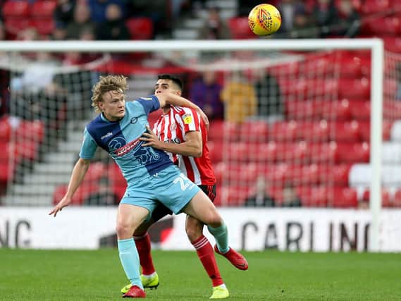 Sunderland's Reece James and Wycombe Wanderers Alex Samuel (left) battle for the ball. Picture: Richard Sellers/ PA Images