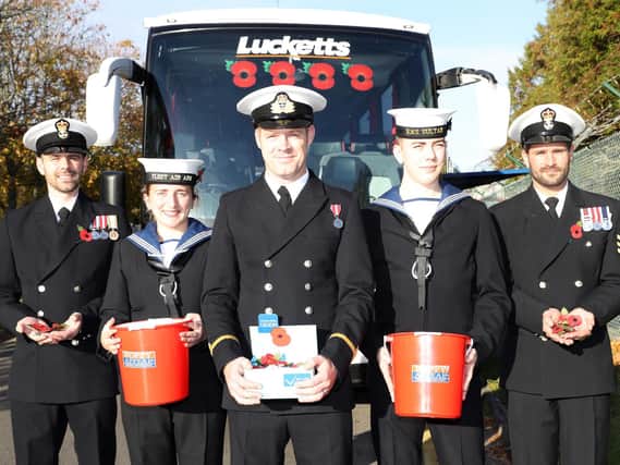 From left, PO Higgins,  AET KAY, SLT Stevens,MA Bulmer-Lidsay and PO Piper in front of the Lucketts coach that transported personnel to London Poppy Day. Picture: PO Phot Nicola Harper