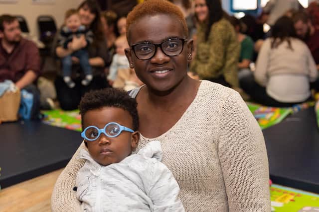 Bola Badmus with Timothy Owolabi, 11 months Picture: Vernon Nash (180683-008)