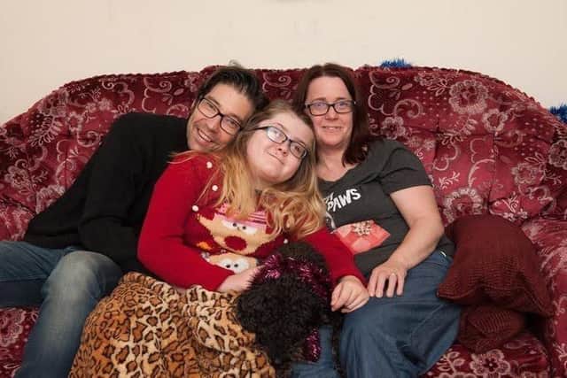 Dan White with daughter Emily, 12, and wife Aimee