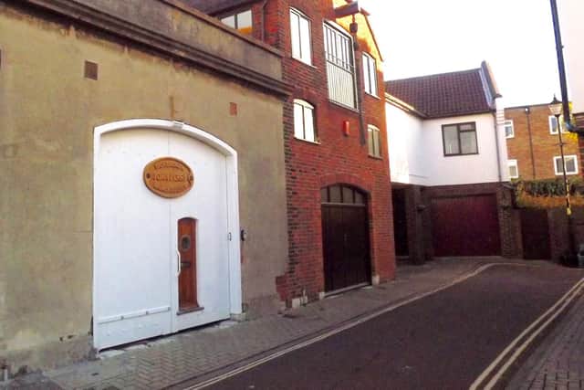 Oyster Street today with modern doors and the pulley arm has been reinstated with block and tackle.