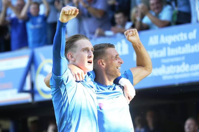 Ronan Curtis (left) is aiming for many more celebrations with Pompey. Picture: Joe Pepler