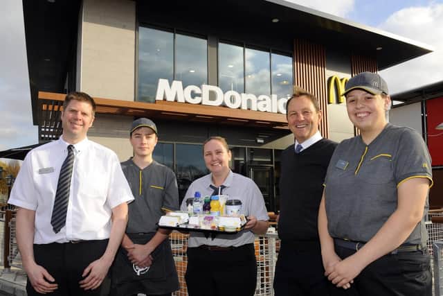 The new McDonald's at Brockhurst Gate, on the A32 Gosport to Fareham main road opened earlier this week
(left to right) Gosport team - business manager Rich Price, Lucas Miles, Charlene Stirton, Franchisee Grant Copper, and Jordan King 
Picture by:  Malcolm Wells (181121-7832)