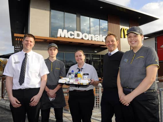 The new McDonald's at Brockhurst Gate, on the A32 Gosport to Fareham main road opened earlier this week
(left to right) Gosport team - business manager Rich Price, Lucas Miles, Charlene Stirton, Franchisee Grant Copper, and Jordan King 
Picture by:  Malcolm Wells (181121-7832)
