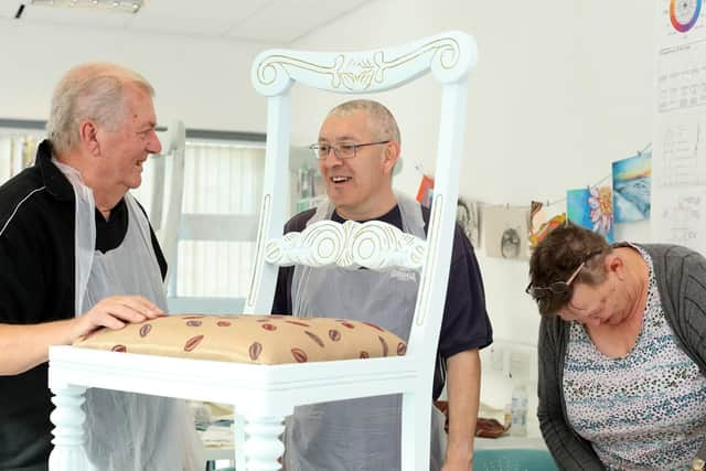 From left, Barry Haines, Vince Wymss and Yvonne Fornalski at work. Junk to Funk workshop