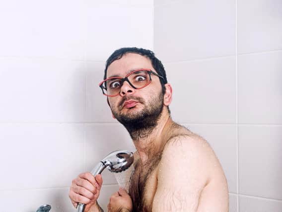 Steve Canavan was horrified when he realised he'd got stuck in the shower (picture posed by model)