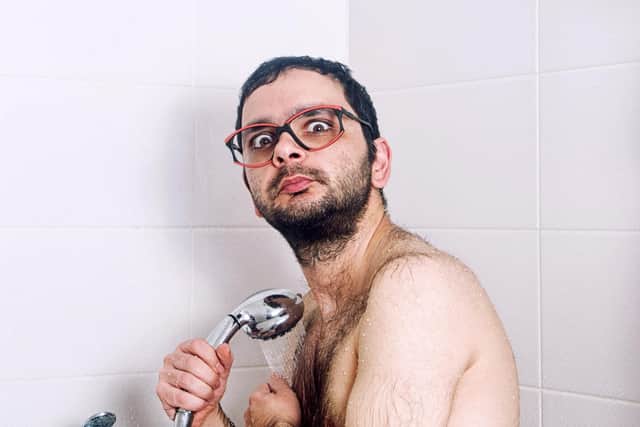 Steve Canavan was horrified when he realised he'd got stuck in the shower (picture posed by model)