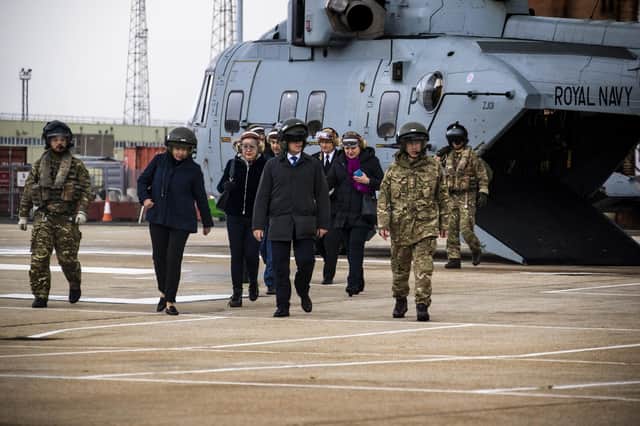 The Deputy Defence Minister for Ukraine, Lieutenant General Anatoli Petrenko has visited Portsmouth Naval base alongside other top officials from the Ukraine. Here they are pictured arriving at the city's naval base via helicopter.