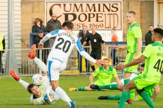 Alfie Rutherford struck a treble for the Hawks to see off Maidstone