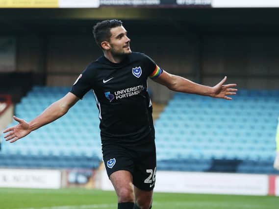 Gareth Evans celebrates putting Pompey on their way to a maiden victory at Glanford Park. Picture: Joe Pepler/Digital South.