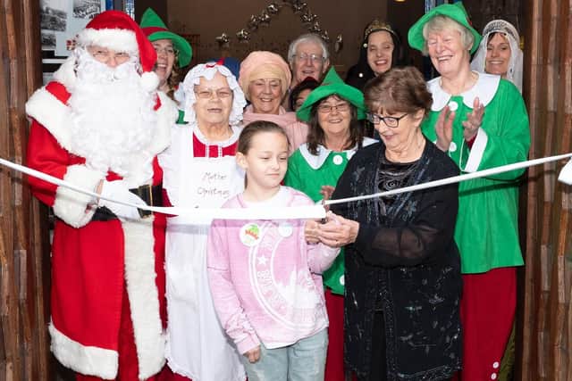 Beryl Jones and Nancy-Mae Wright cut the ribbon to open the Starlight Festival. Picture: Keith Woodland