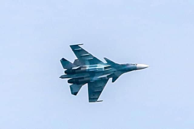 A Russian jet flying past HMS Duncan in Black Sea.