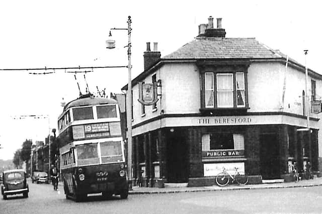 THEN: When Twyford Avenue, Stamshaw, Portsmouth, had two-way traffic. With a trolleybus heading for Clarence Pier and the Beresford pub, this was Stamshaw in 1954. Picture: Barry Cox Collection.