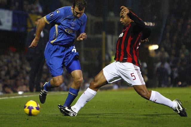 Portsmouth's Glen Little takes on Emerson as AC Milan visit Fratton Park
