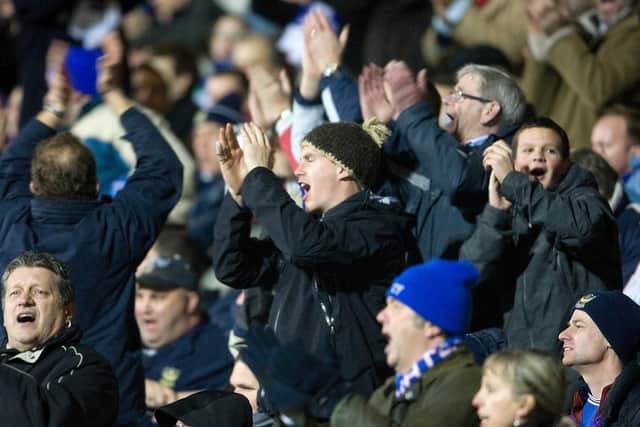 Pompey fans celebrate going 2-0 up against AC Milan