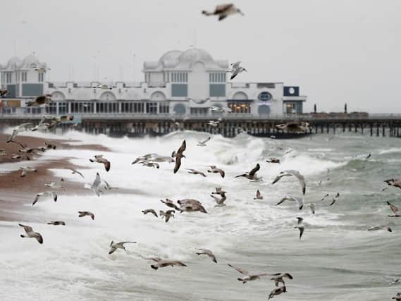 Waves crash on the seafront near to the South Parade pier in Southsea. Picture: Andrew Matthews/PA Wire
