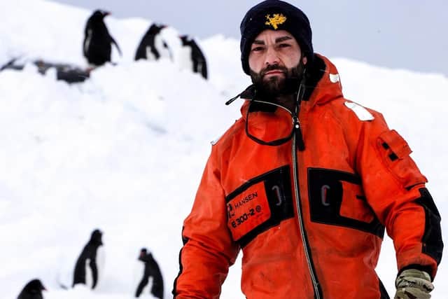 LPT David Clayton-Charlesworth and some penguins at Port Lockroy. LPT Clayton-Charlesworth was part of the working party at Port Lockroy.
