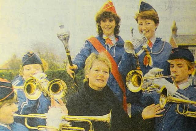 Pictured is Horndean Marching Band serenading Jean Grinyer as a birthday surprise.