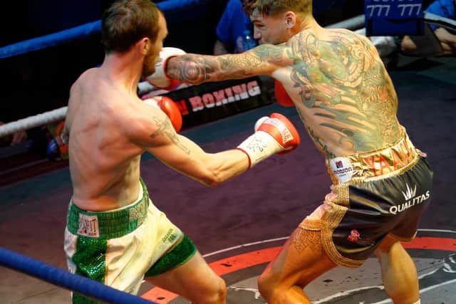 Joel McIntyre in the ring with Miles Shinkwin at Liquid & Envy in 2016 Picture: Neil Marshall